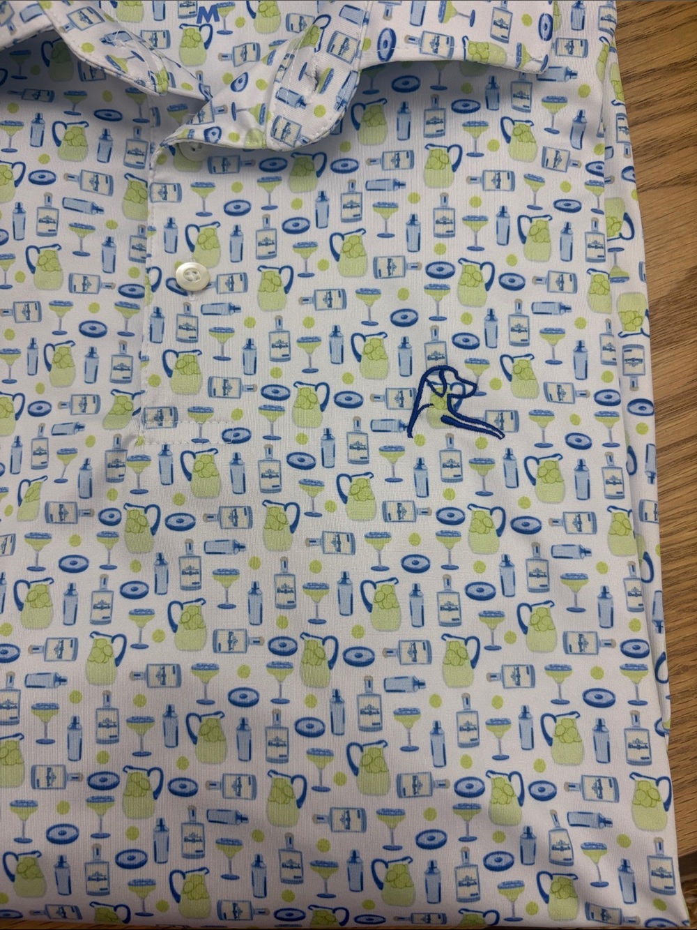 Rhoback polo Size M cocktail pattern
